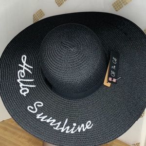 Ladies Black Straw Hat. Just in time for summer.